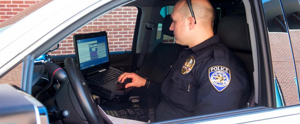 Officer on his computer