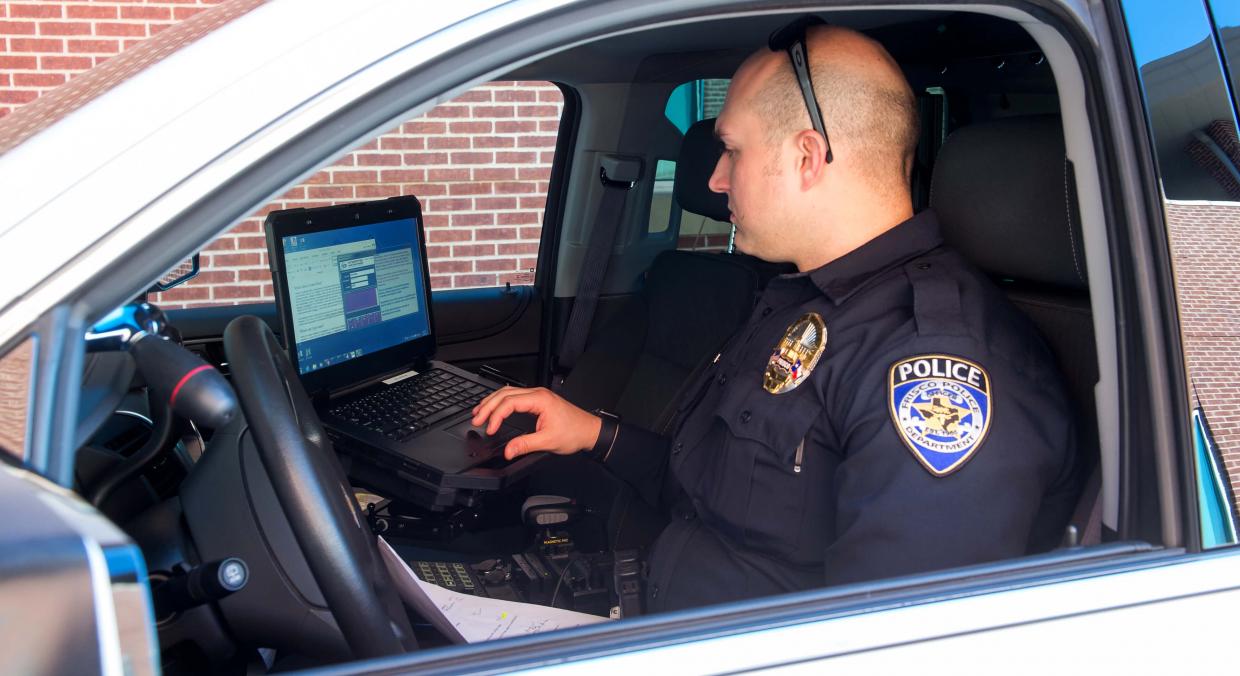 Officer on his computer